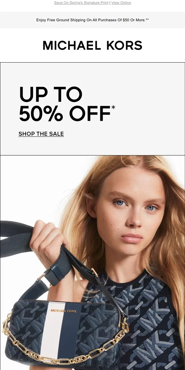 Email from Michael Kors. Up To 50% Off Empire Logo Handbags